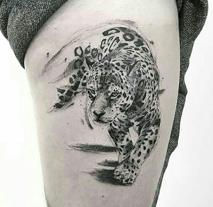 Hình xăm báo đốm trên bắp tay, phong cách blackwork chi tiết, ảnh HD.