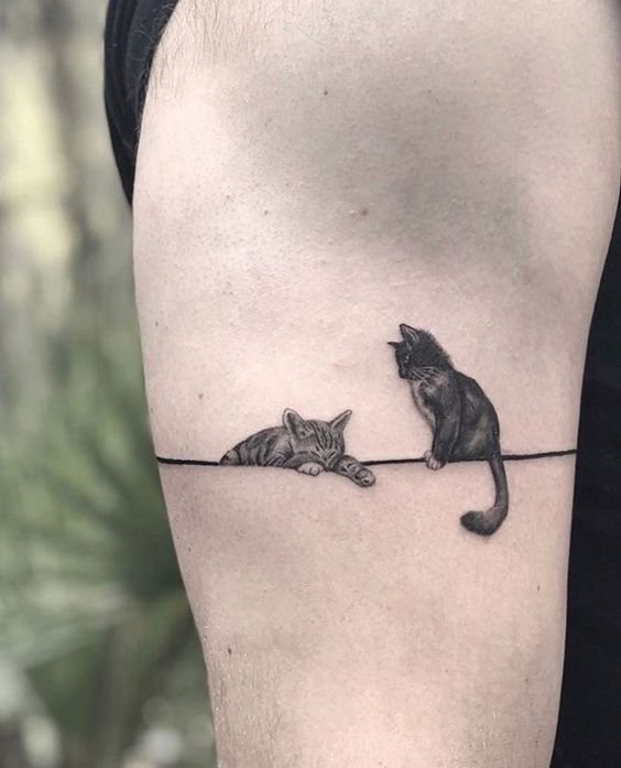 Hình xăm mèo mini trên tay, phong cách blackwork chi tiết, ảnh HD.